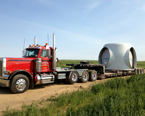 Truck transporting wind mill section.png
