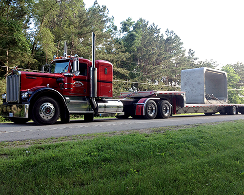 Truck transporting box culvert.png