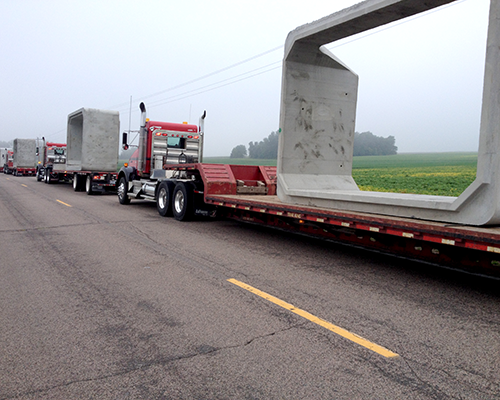 Trucks transporting box culvert-3.png